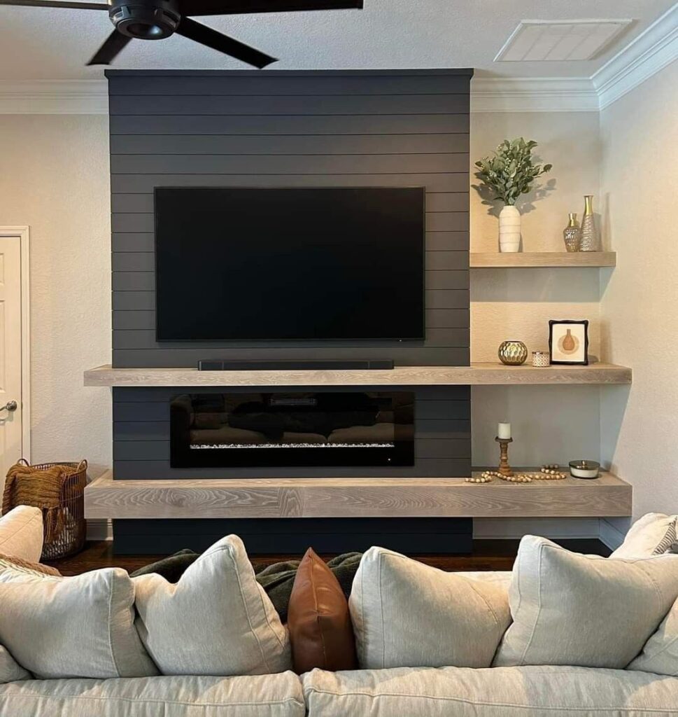 shiplap TV wall with electric fireplace and floating shelves Florida