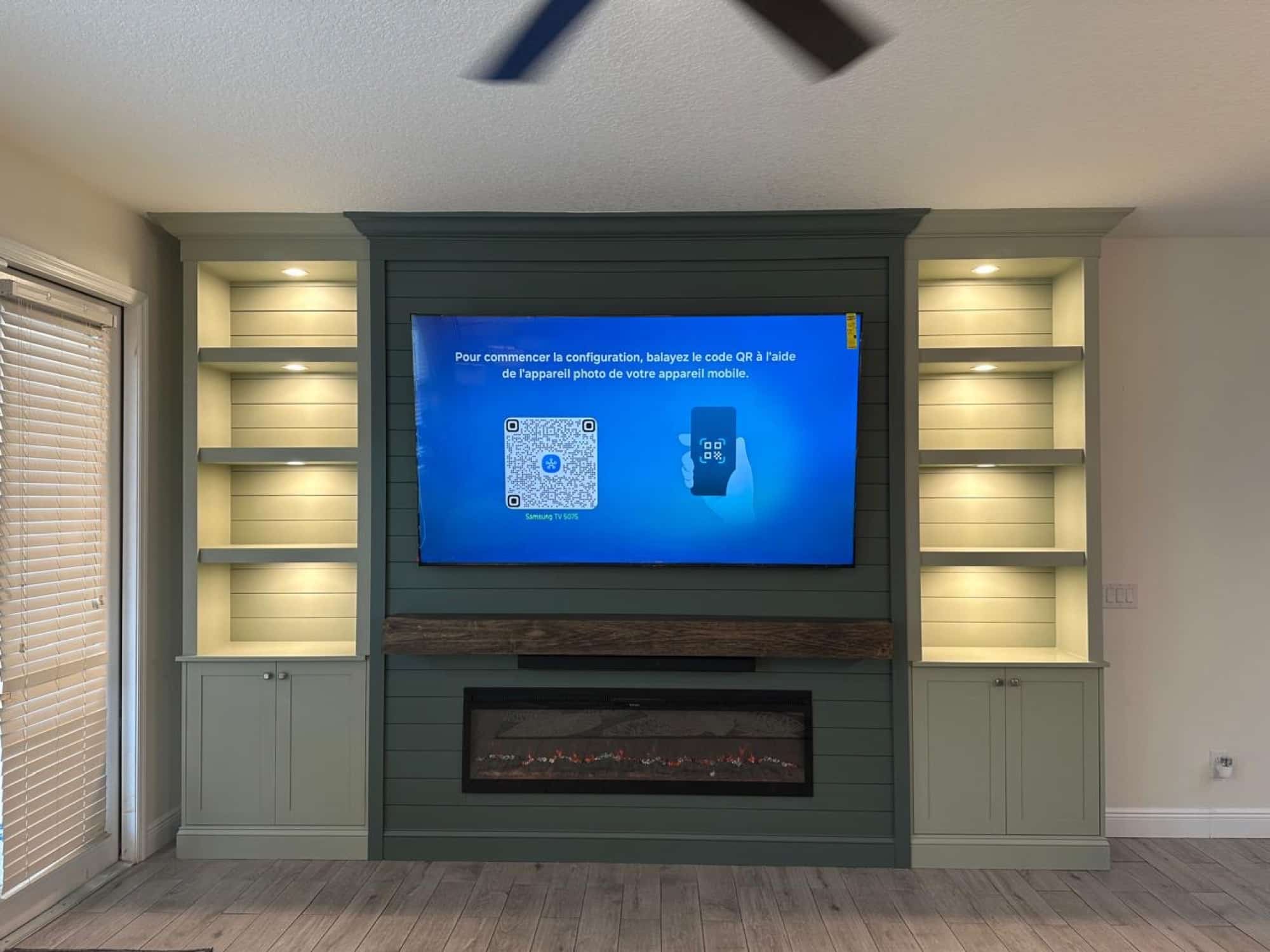 Green shiplap fireplace media wall