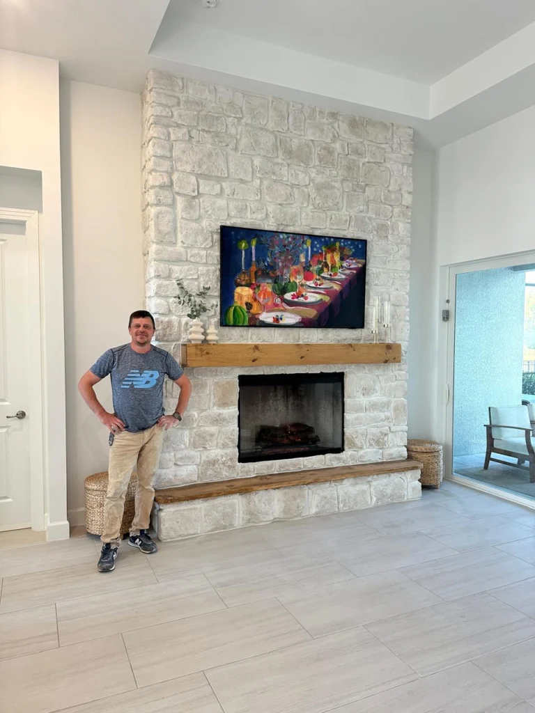 Luxury limestone fireplace in a bright Florida living room